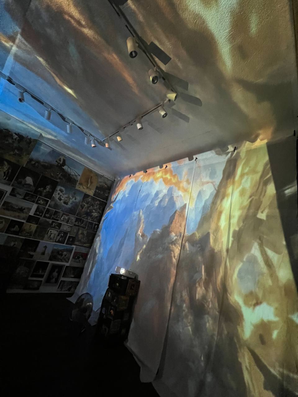 Paintings projected on the walls and ceiling of Gallery 36 during the immersive show