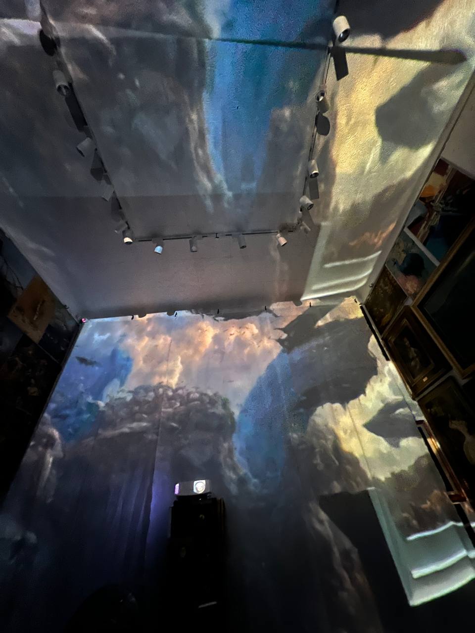 Paintings projected on the walls and ceiling of Gallery 36 during the immersive show