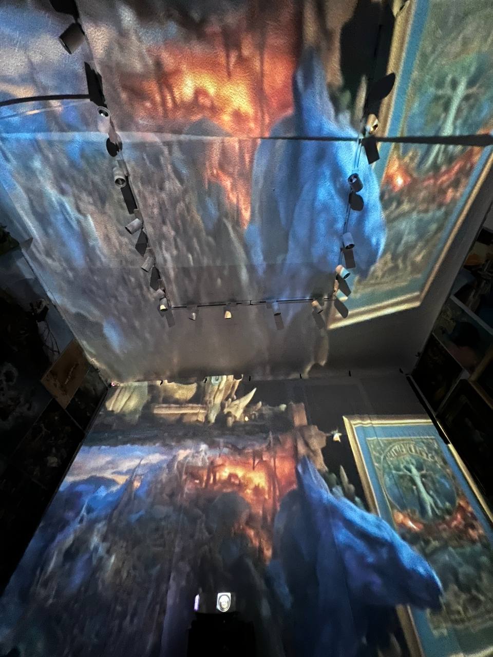 Paintings projected on the walls and ceiling of Gallery 36 during the immersive show
