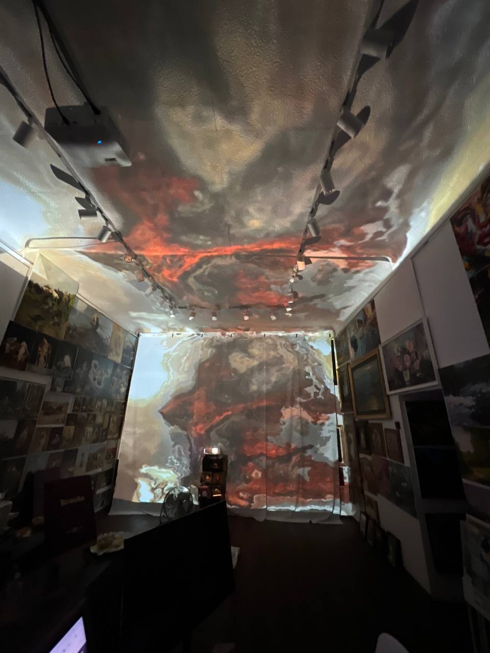 Paintings projected on the walls and ceiling of Gallery 36 during the immersive show