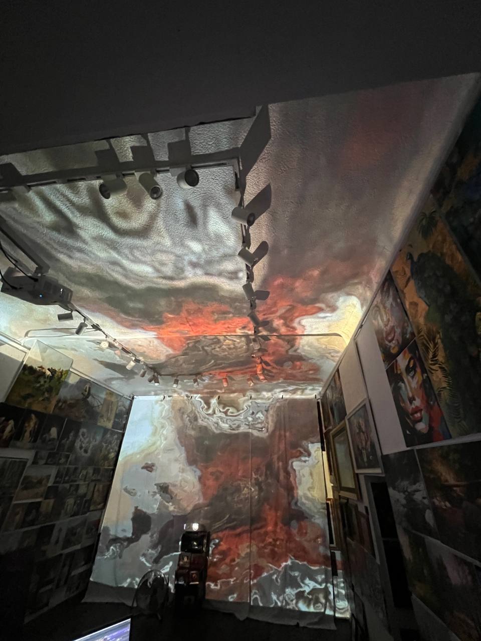 Paintings projected on the walls and ceiling of Gallery 36 during the immersive show