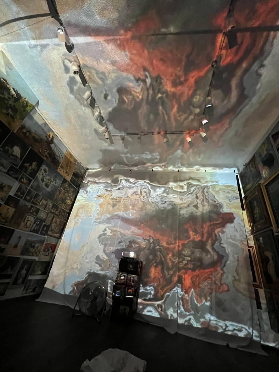 Paintings projected on the walls and ceiling of Gallery 36 during the immersive show